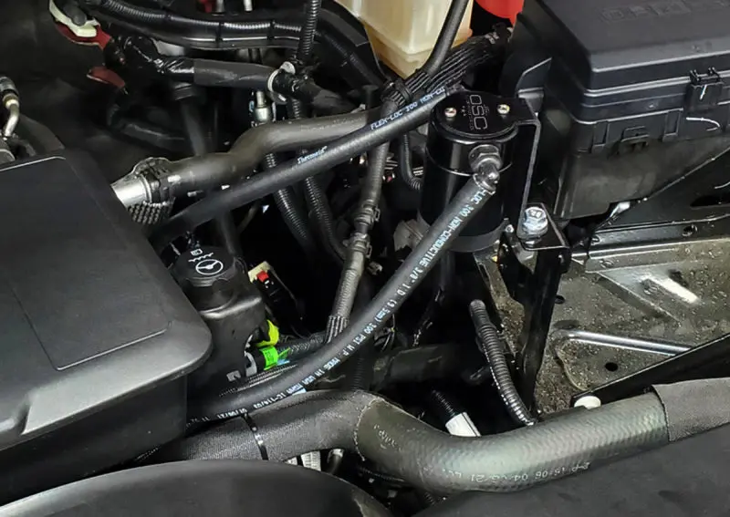 J&L | 2020-2026 Gm 2500 / 3500 6.6L Gas Engine Drivers Side Oil Separator 3.0 - Black Anodized 2