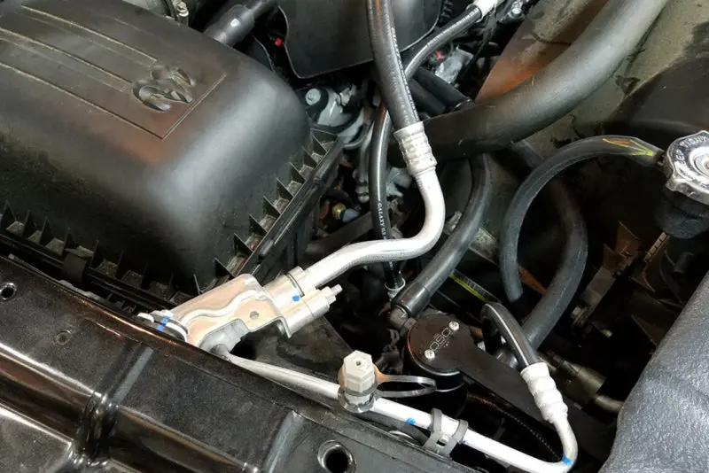 J&L | 2009-2018 Dodge Ram 1500 Classic 5.7L Passenger Side Oil Separator 3.0 - Black Anodized 2