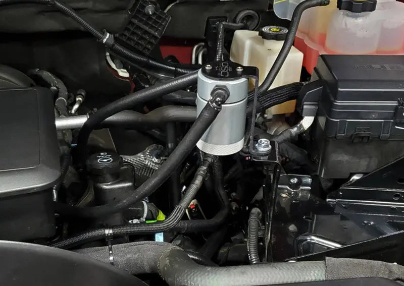 J&L | 2020-2026 Gm 2500 / 3500 6.6L Gas Engine Drivers Side Oil Separator 3.0 - Clear Anodized 2