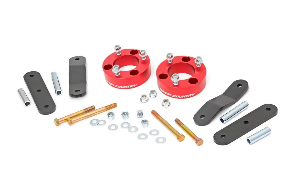 Rough Country | 2005-2024 Nissan Frontier 2Wd / 4Wd 2.5 Inch Lift Kit - No Struts (Red Spacer) 1